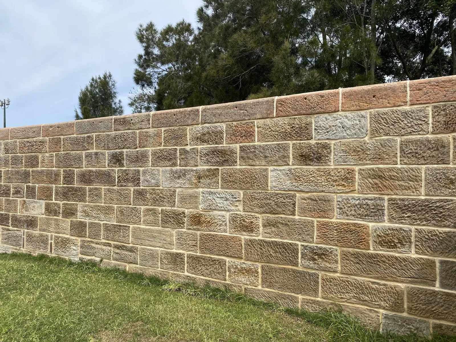 Repointed sandstone wall